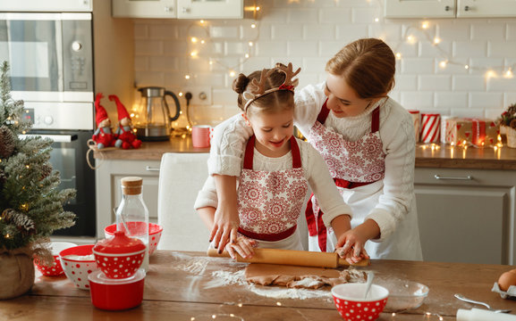 happy family mother and child bake christmas cookies.