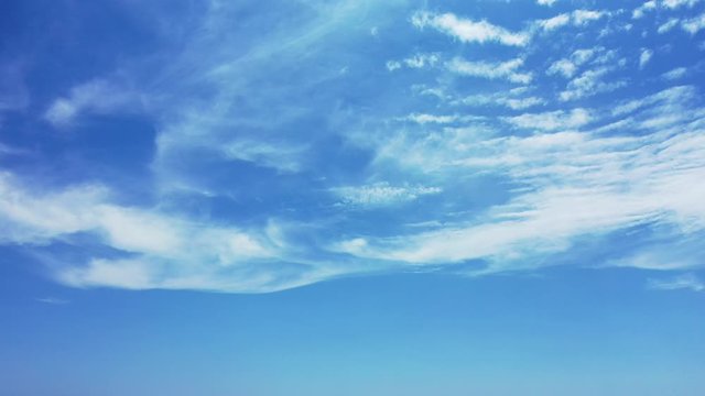 Peaceful beautiful structure of frozen clouds into blue heaven over Pacific ocean, sky texture design, copy space