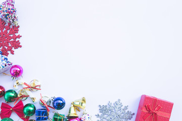 Christmas composition. Gifts, fir tree branches, red decorations on white background. top view, copy space