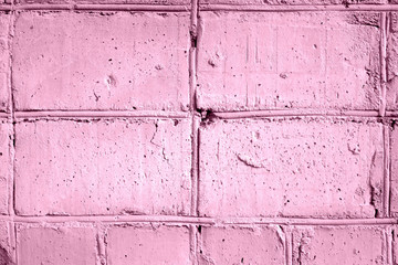Painted brick wall texture close-up. Abstract background pink color toned