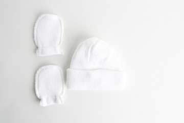 white wool hat and mittens for baby