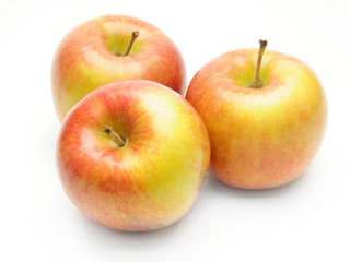 Ripe apples on a white background