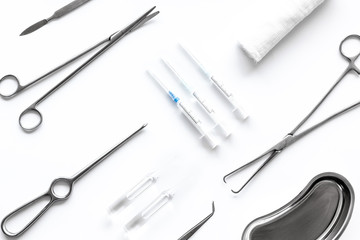 Instruments for plastic surgery on white background top view flat lay pattern