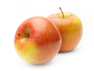 Ripe apples on a white background