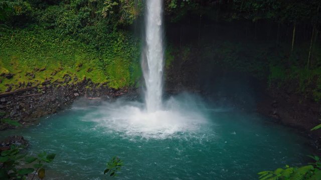 A beautiful seamless video loop / Cinemagraph of the Arenal Waterfall at La Fortuna in the Jungle.