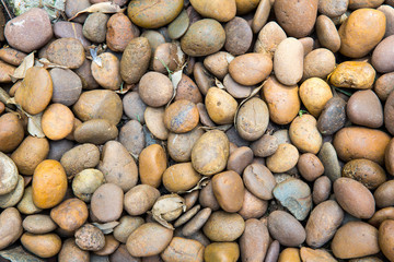 Sea pebbles. Small stones gravel texture background.Pile of pebbles, thailand.Color stone in background.