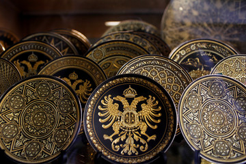 Damascene gold and back circle decoration 