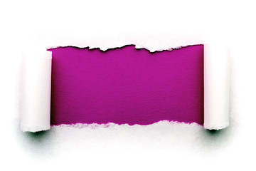 A hole in white paper with torn edges isolated on a white background with a burgundy color paper background inside. Good sharp paper texture.