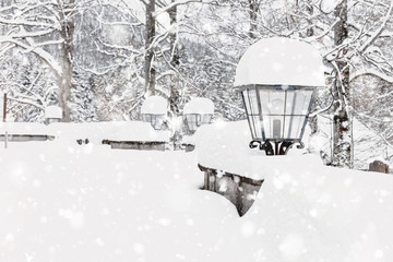 Streetlight lamps with fresh snowfall in winter