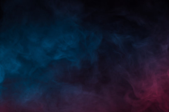 Colorful smoke close-up on a black background
