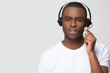 Support operator, African American man in headphones with microphone