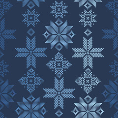 Fototapeta na wymiar Abstract winter seamless pattern on dark blue background. Geometric decor of polka dots.