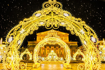 winter moscow wonderland landmark at night christmas new year city street light decoration against black sky background. Street wide view of town center in heavy snowfall