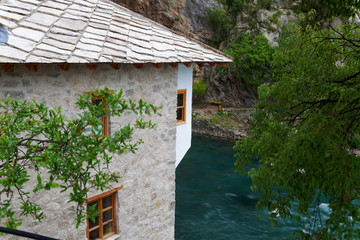 Fototapeta na wymiar Source of the Buna River with old muslim kasaba, Bosnia and Hercegovina Bosna i Hercegovina
