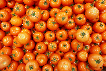 Healthy beautiful red tomatoes background.