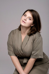 plus size model on gray background