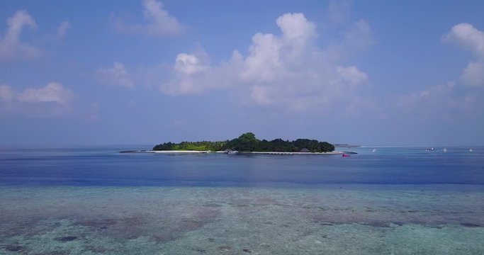 Bora Bora Islands- Lush Of Green Island In The Middle Of The Shallow Waters, And Clear Blue Oceans With A Perfection Of A Summer Sky - Wide Shot