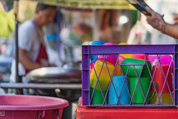 Plastic cup at noodle shop street food.