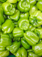 Obraz na płótnie Canvas A lot of green bell pepper in the super market
