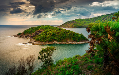 Island with seascape and sky and cloud storm in evening light