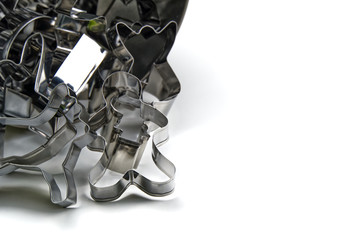 Naklejka premium gingerbread cookie cutter. stainless steel molds for baking christmas cookies. isolated on white with copy space