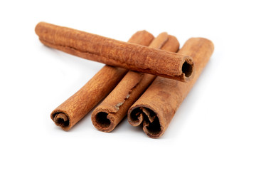 Top view cinnamon sticks isolated on white background.