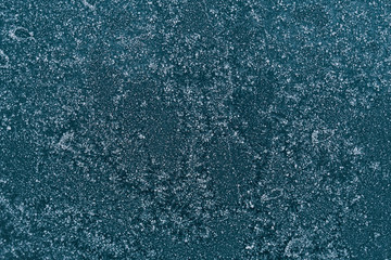 Frozen window. Abstract winter background - blue frozen window.