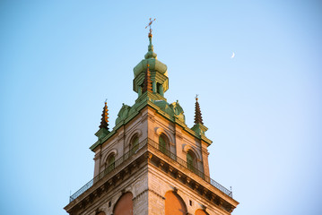 Fototapeta na wymiar church bell tower on sunset