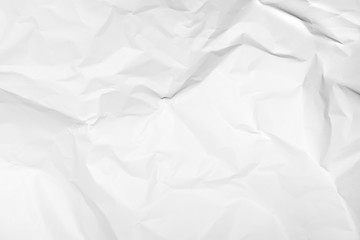 White crumpled paper texture background.