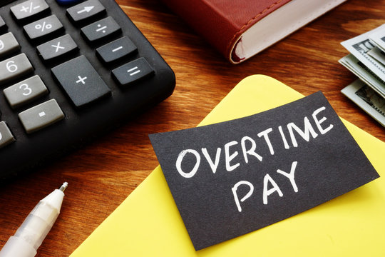 Text Sign Showing Hand Written Words Overtime Pay