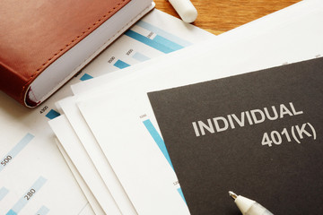 Writing note shows the text Individual 401(k)
