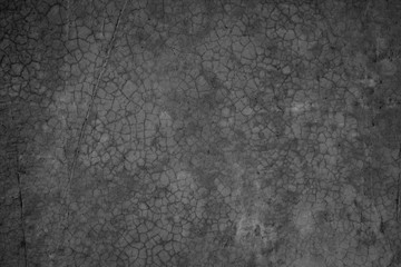 Art black concrete stone texture for background in black. Abstract color dry scratched surface wall cover colorful paper scratches shabby vintage Cement and sand grey dark detail covering.