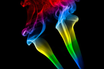 MULTICOLOR SMOKE AGAINST BLACK BACKGROUND