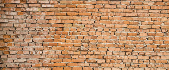 Texture of an old wall with red brick for background.