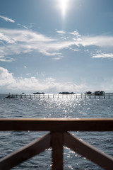 view of water chalets under the sun in Semporna, Sabah.