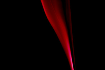 REDDISH SMOKE AGAINST BLACK BACKGROUND