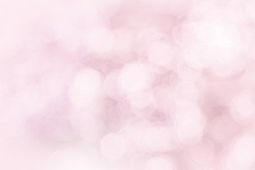 Abstract texture of pink bokeh christmas lights in celebration. Sparkling product background or blurred background with nature glowing sun light flare. blurred and defocused spring concept for design.