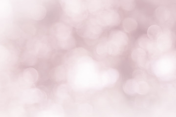 Abstract texture of pink bokeh christmas lights in celebration. Sparkling product background or blurred background with nature glowing sun light flare. blurred and defocused spring concept for design.