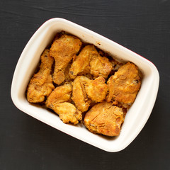 Delicious homemade oven baked fried chicken in a dish, top view. Flat lay, overhead, from above.