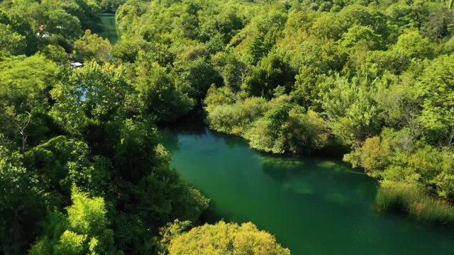 Aerial footage of the river Cetina near Omis, Croatia. Pristine clear emerald water and beautiful trees - stock video