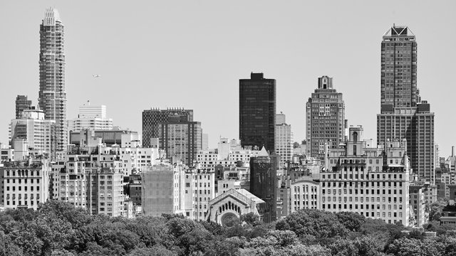 Black and white picture of Manhattan Upper East Side by the Central Park, New York, USA.