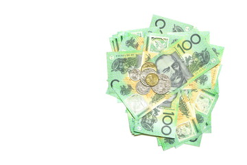 Group of 100 dollar Australian notes pile and coins of Australian money on white background have copy space for put text