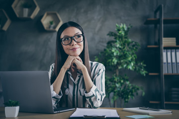 Photo of cheerful positive pretty cute girlfriend having been employed to job in famous transnational corporation as econimist dreaming of being promoted at career