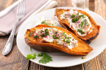 baked sweet potato with cream and herb