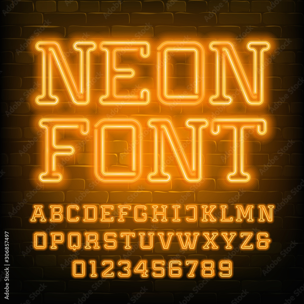 Fototapete neon alphabet font. yellow neon serif letters and numbers. brick wall background. stock vector types