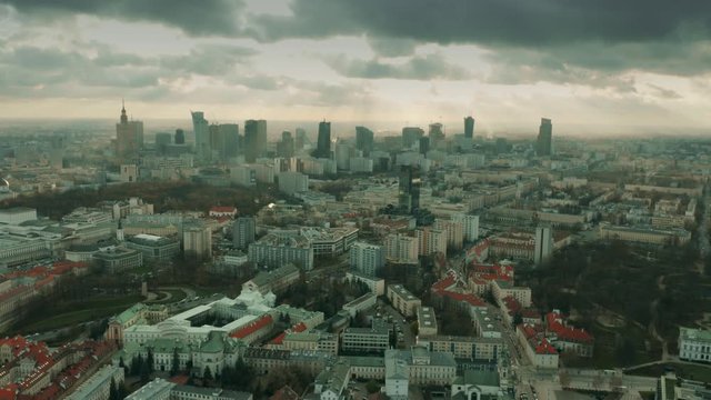 Aerial view of Warsaw cityscape on a partially cloudy day, Poland