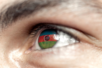 Flag of azerbaijan reflects in a man brown eye - election, sport, hope, young, generation	