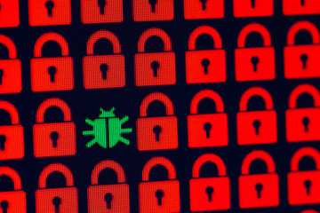 Bug as a symbol of malware and a Trojan virus in the program code. Hacking and theft of personal information and data. Red pixel locks and Green Bug on a black background, close-up