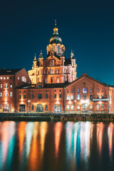 Fototapeta premium Helsinki, Finland. View Of Kanavaranta Street With Uspenski Cathedral In Evening Night Illuminations