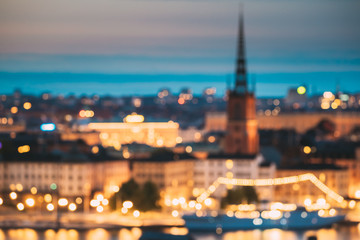 Stockholm, Sweden. Night Skyline Abstract Boke Bokeh Background. Design Backdrop. Riddarholm Church...
